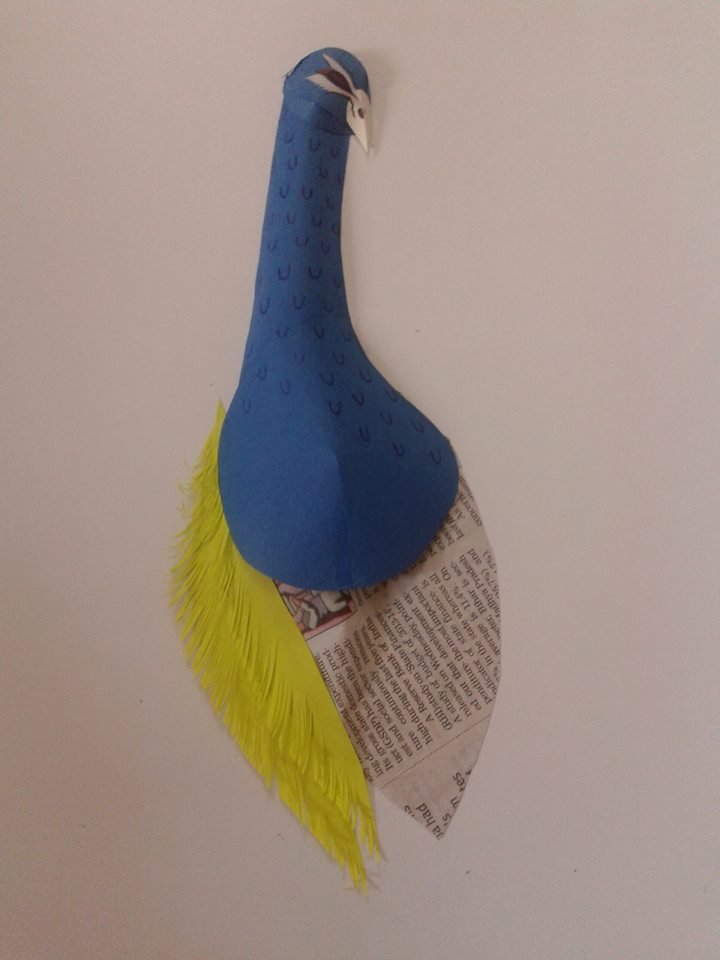 Peacock with paper