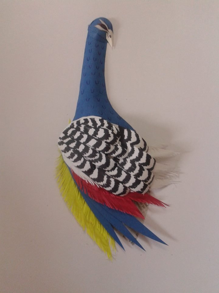 Peacock with paper