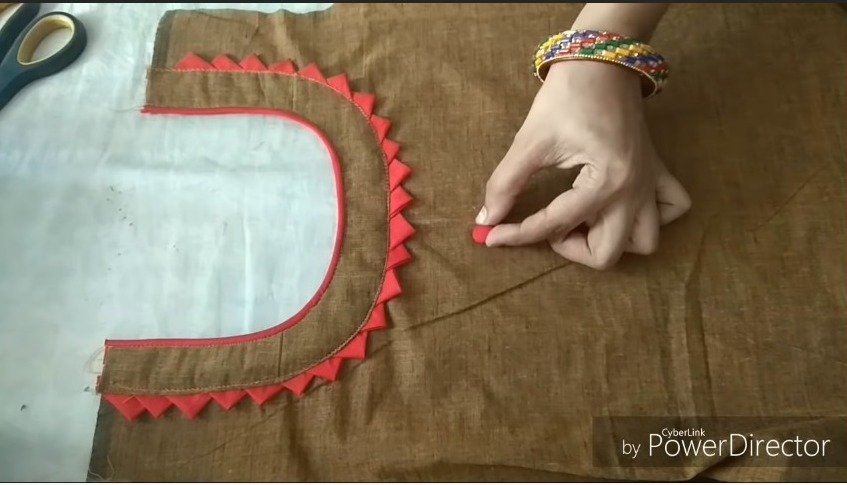 Creative neck design cutting and stitching with fabric button making