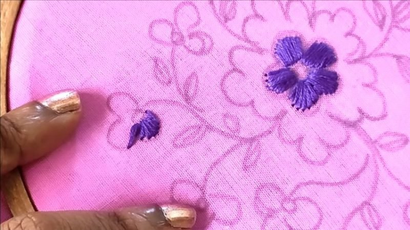 stihing with a violet color thread