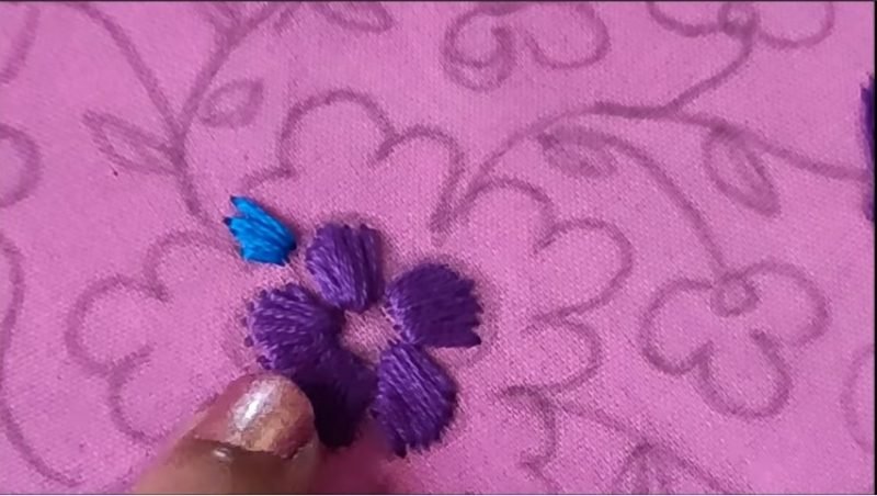 flower stitching with blue color thread