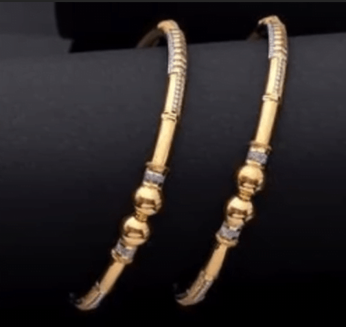 Exclusive gold bangles designs 13