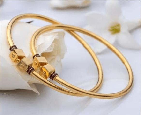 Exclusive gold bangles designs 15