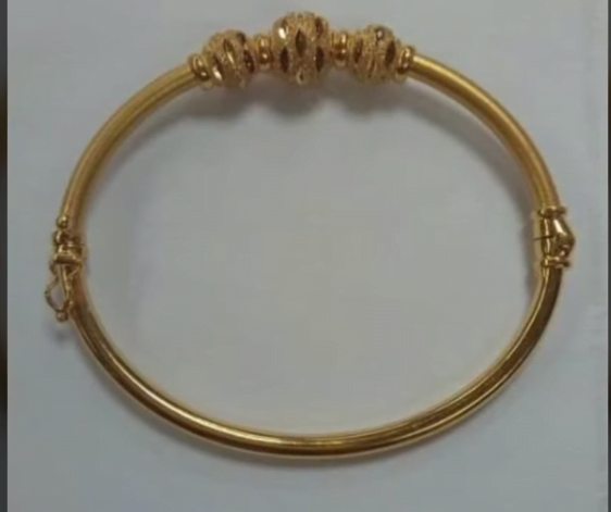 Exclusive gold bangles designs 21