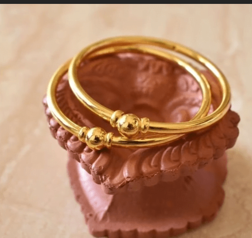 Exclusive gold bangles designs 25