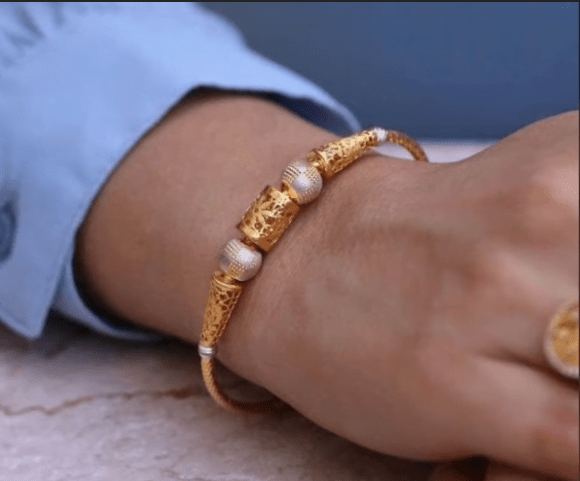 Exclusive gold bangles designs 28