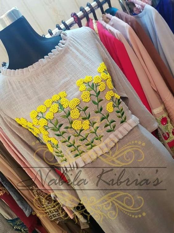 designer kurtha with embroidery and ruffles