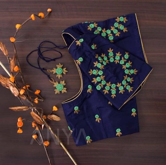 blue blouse with floral embroidery