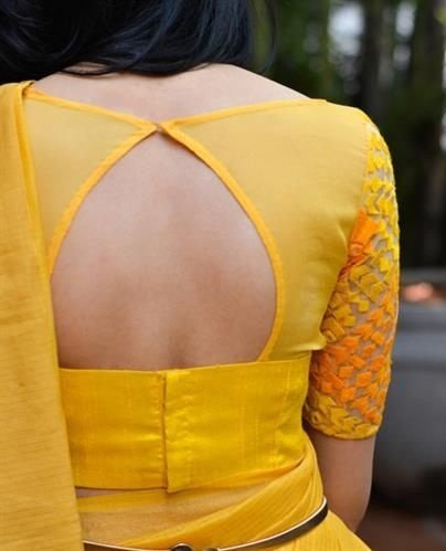 yellow triangle opening blouse design