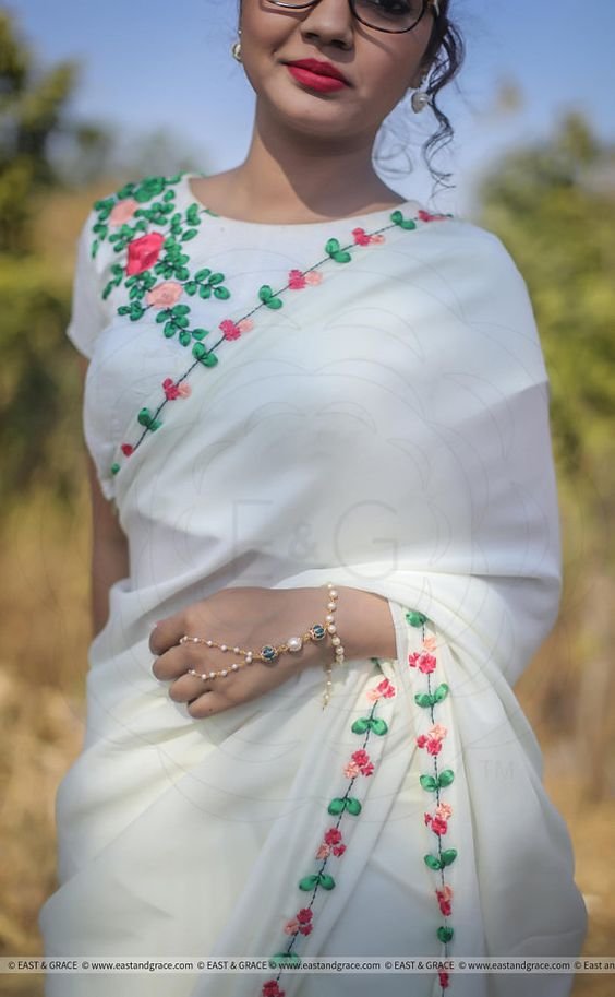 white blouse with floral embroidery