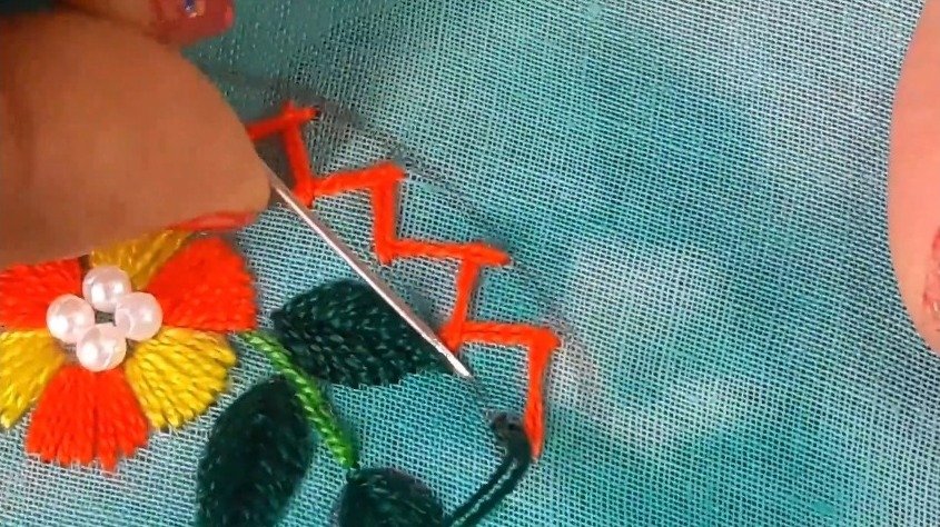 sewing the arc with green thread