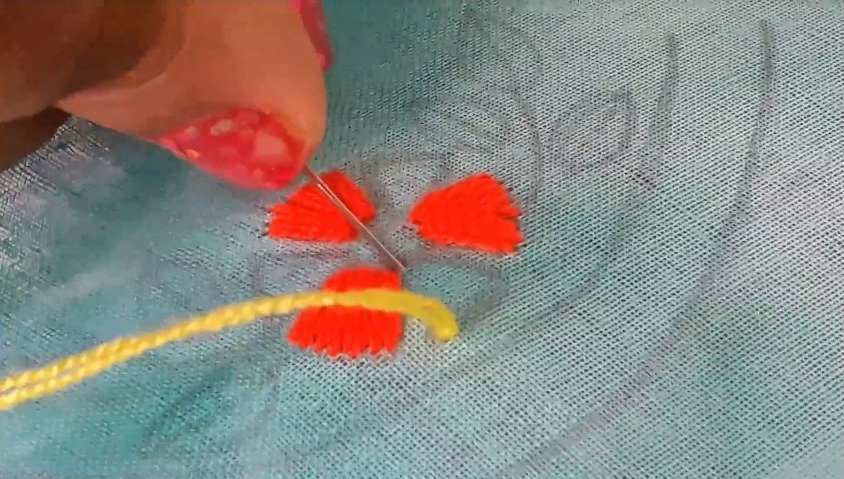 using yellow thread to remaining petals
