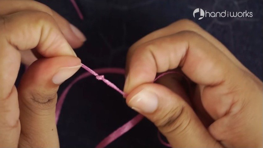 make a knot at end of ribbon