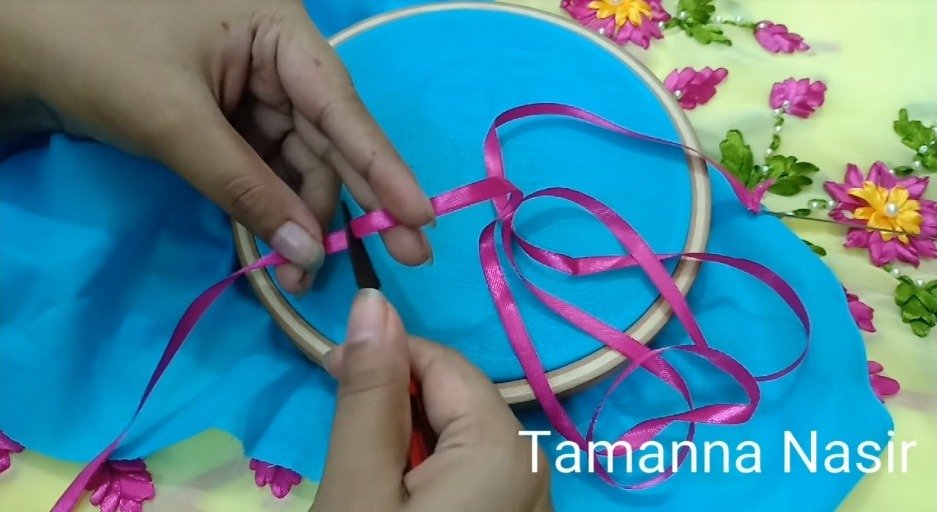 using an embroidery needle to stich