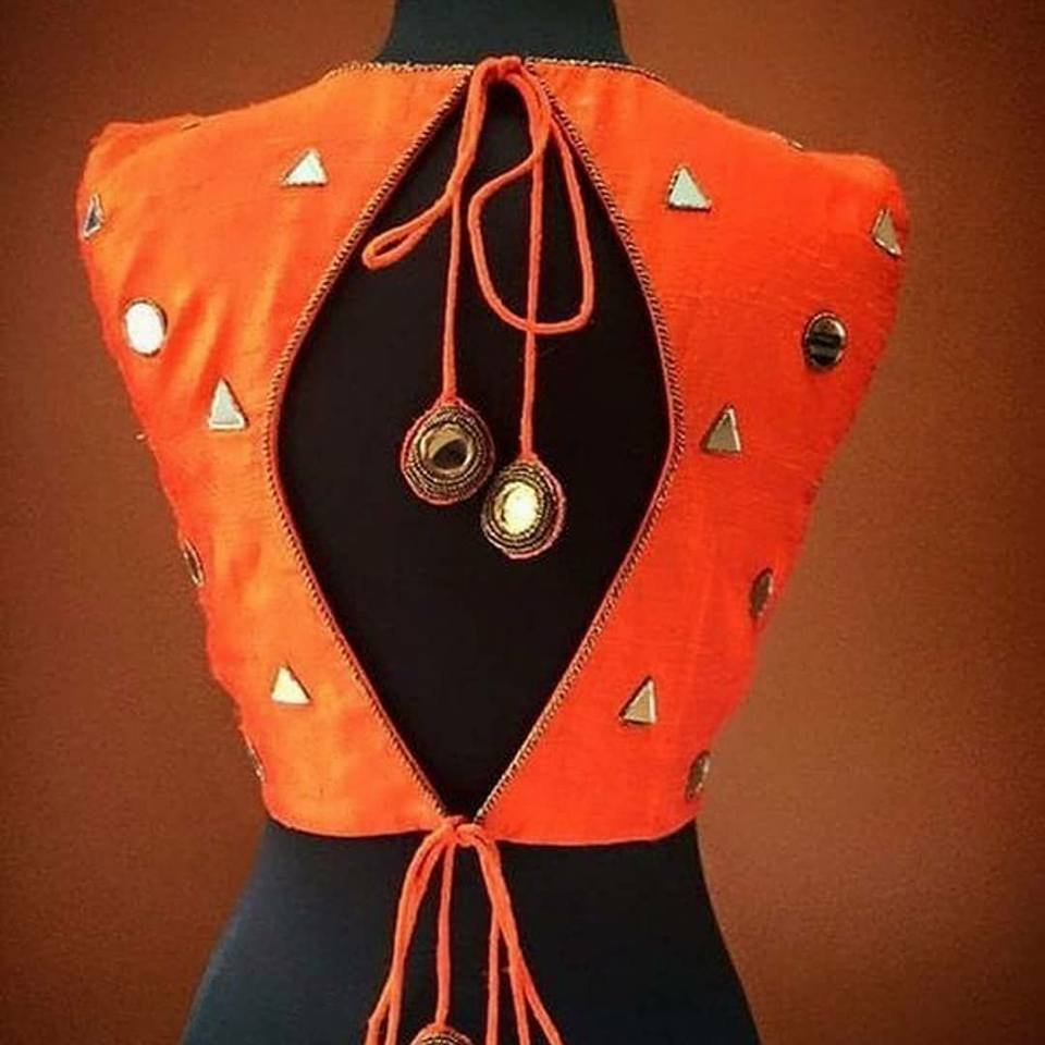 orange blouse with mirror work