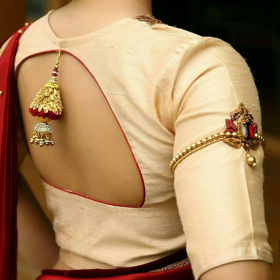 golden blouse with hangings