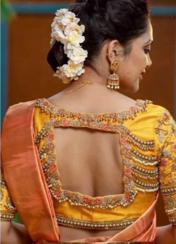 Top 10 Trending Yellow Blouse Designs for Traditional Look 13