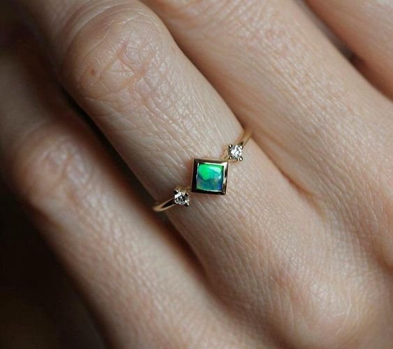ring with the green stone 10